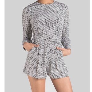 Like New! Rachel Zoe 100% Silk Meg Geo long sleeve romper - Size 8